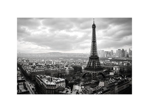 Black and white panoramic view of the Eiffel Tower overlooking the Paris cityscape