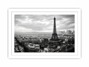 Black and white panoramic view of the Eiffel Tower overlooking the Paris cityscape