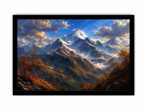 Majestic snow-covered mountain peaks with autumn trees beneath a dramatic blue sky