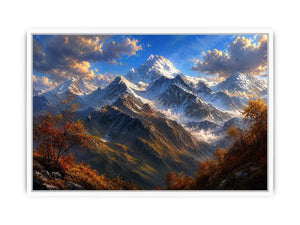 Majestic snow-covered mountain peaks with autumn trees beneath a dramatic blue sky