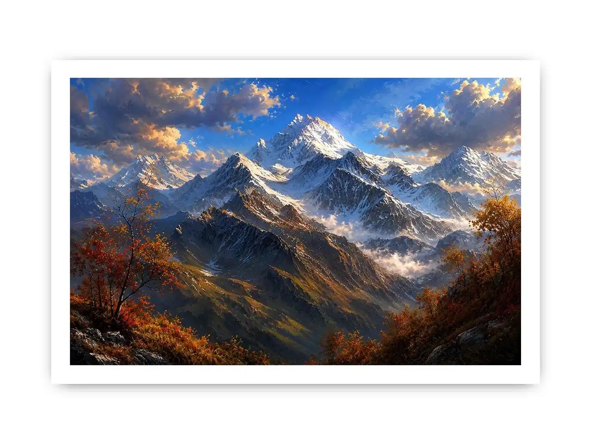 Majestic snow-covered mountain peaks with autumn trees beneath a dramatic blue sky