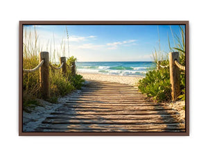 Wooden beach boardwalk leading through coastal dunes toward the ocean shoreline