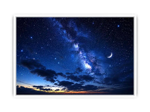 Peaceful night sky artwork featuring a crescent moon glowing among countless stars and deep blue clouds
