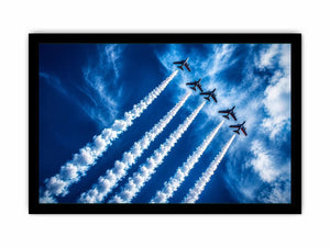 Modern aviation wall art featuring jet planes flying in formation with dramatic smoke trails across deep blue sky in dynamic photography style