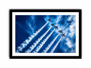 Modern aviation wall art featuring jet planes flying in formation with dramatic smoke trails across deep blue sky in dynamic photography style