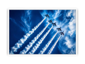 Modern aviation wall art featuring jet planes flying in formation with dramatic smoke trails across deep blue sky in dynamic photography style