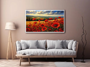 Red poppy flowers blooming across a golden countryside landscape under a dramatic sky