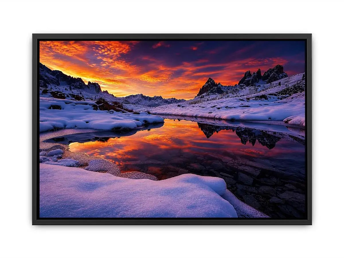 Snowy mountain sunset wall art with frozen lake reflection, colorful twilight sky and peaceful winter landscape photography.