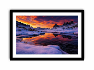 Snowy mountain sunset wall art with frozen lake reflection, colorful twilight sky and peaceful winter landscape photography.