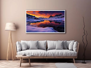 Snowy mountain sunset wall art with frozen lake reflection, colorful twilight sky and peaceful winter landscape photography.