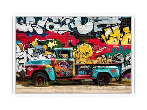 Vintage graffiti pickup truck wall art with colorful urban street mural background.
