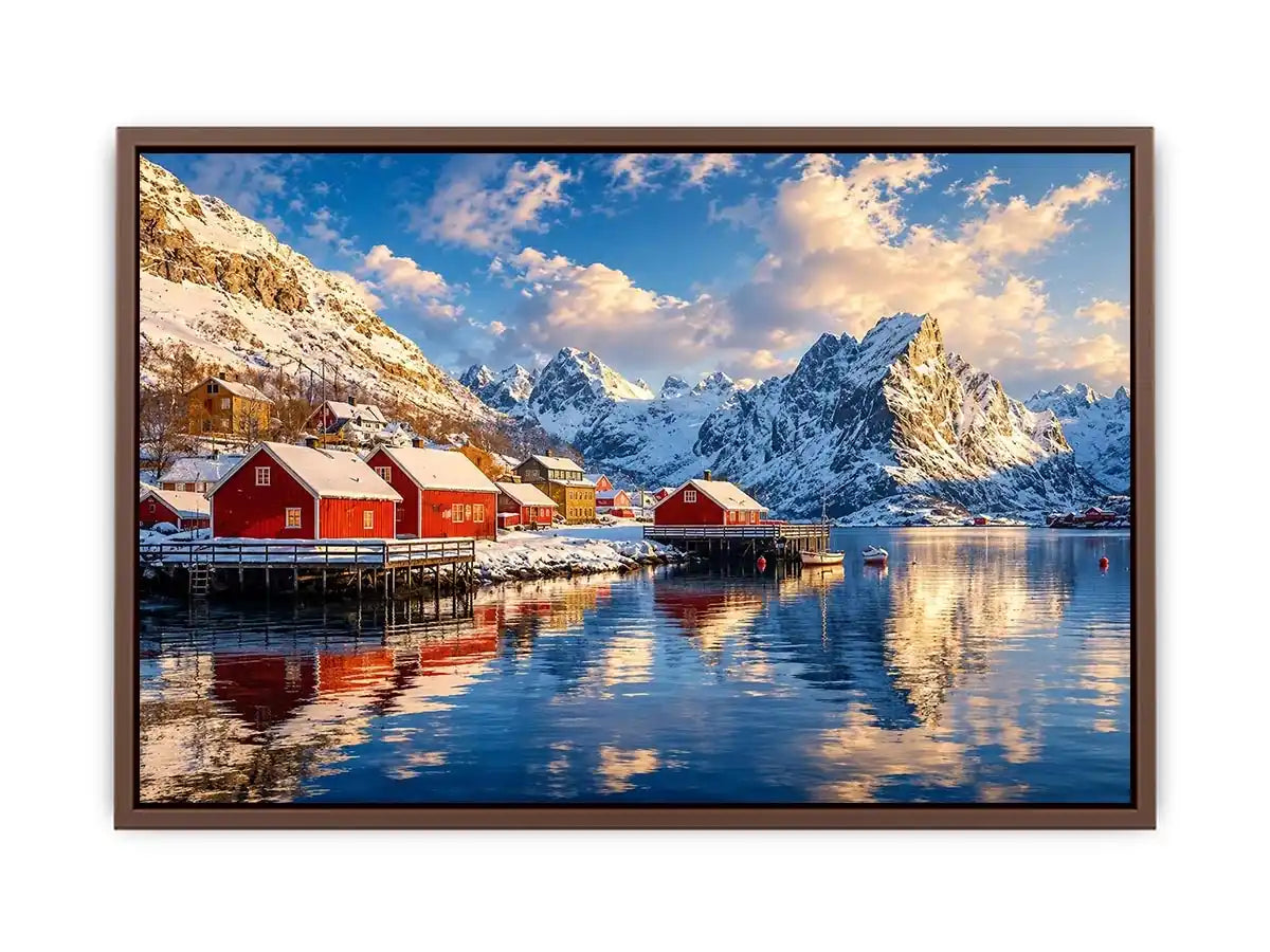 Scandinavian winter village wall art with snowy mountains and calm reflective water for cozy modern interiors.