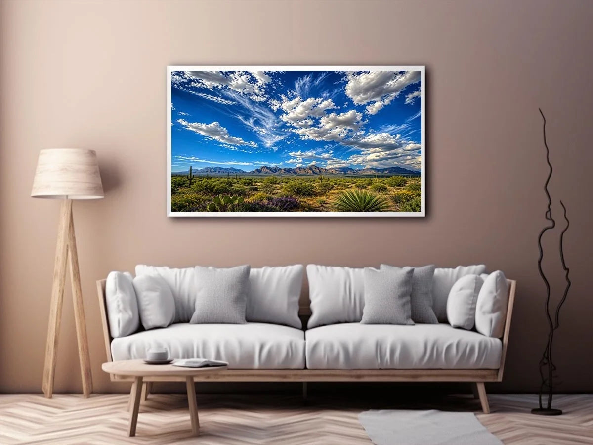 Southwestern desert landscape wall art with dramatic blue sky, mountains, and cactus scenery