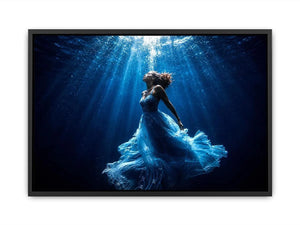 Luxury underwater woman canvas art with flowing blue dress for elegant modern bedroom or living room decor.
