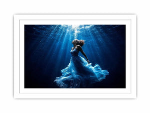 Luxury underwater woman canvas art with flowing blue dress for elegant modern bedroom or living room decor.