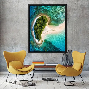 Tropical island aerial canvas art with turquoise ocean for modern coastal living room decor.