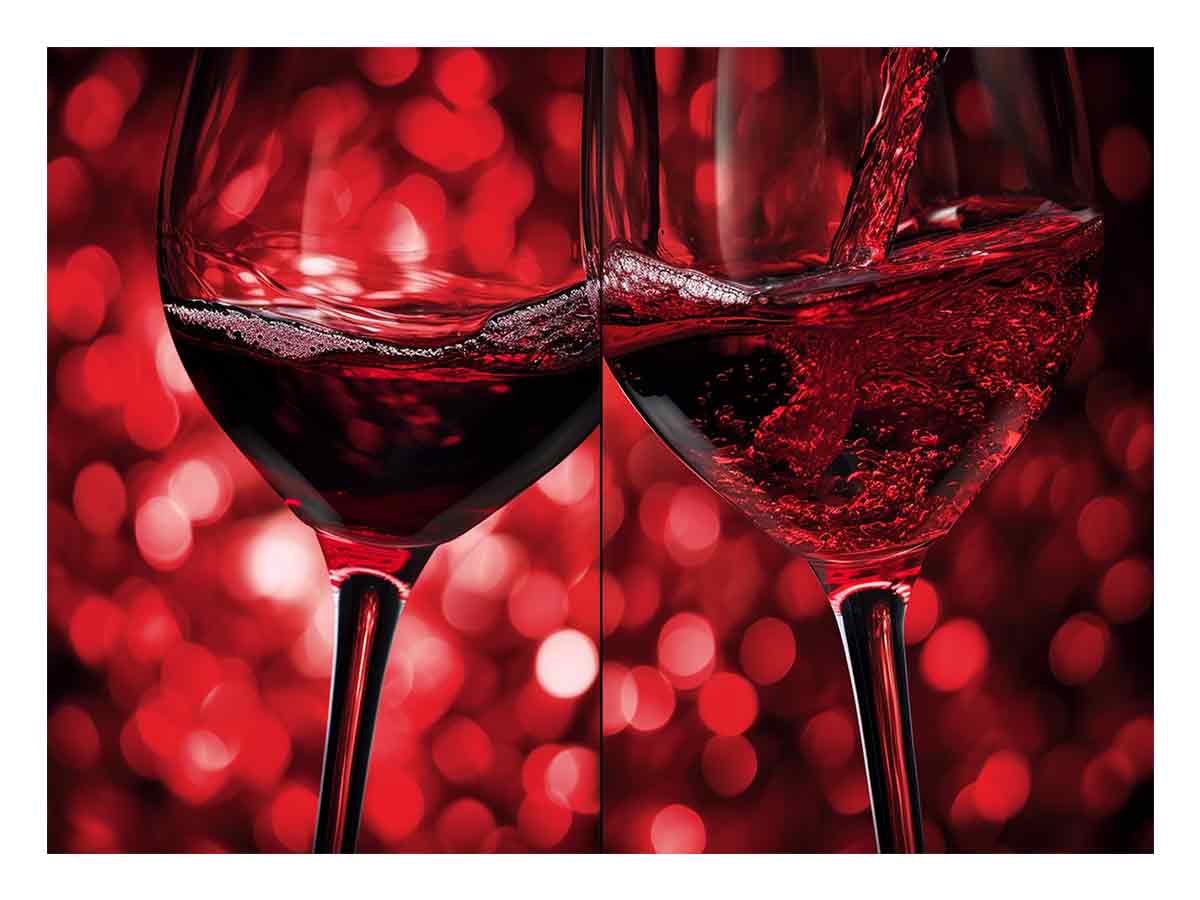 Close up red wine glasses with pouring motion for dining room wall art.