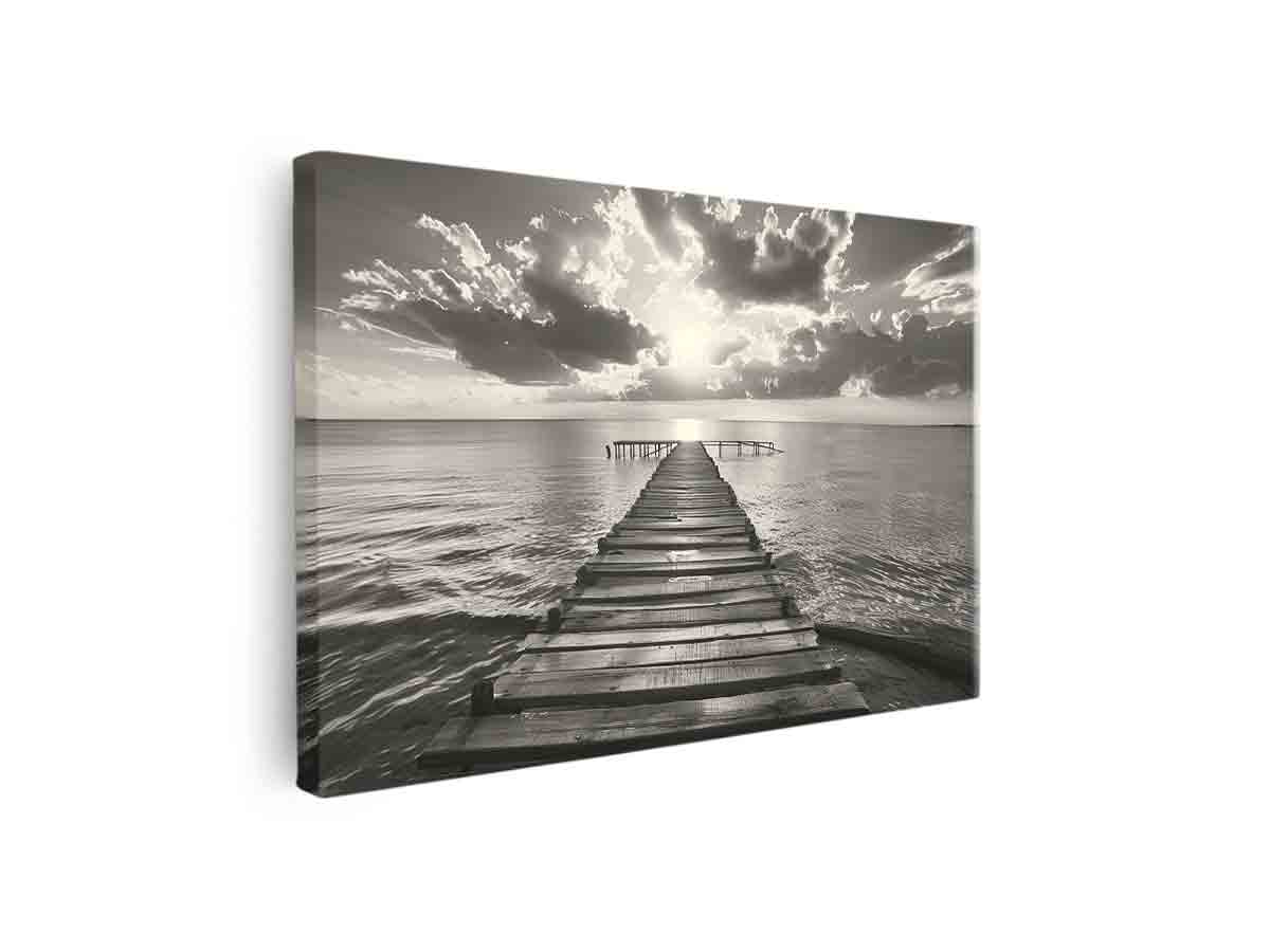 Black and white wooden pier over calm sea with clouds for bedroom decor.