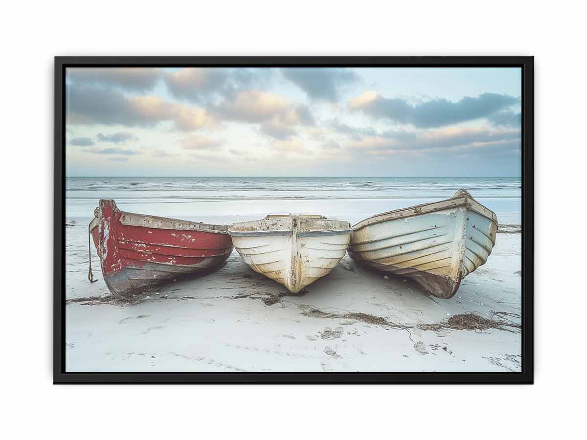 Weathered wooden boats on beach canvas art for coastal living room decor.