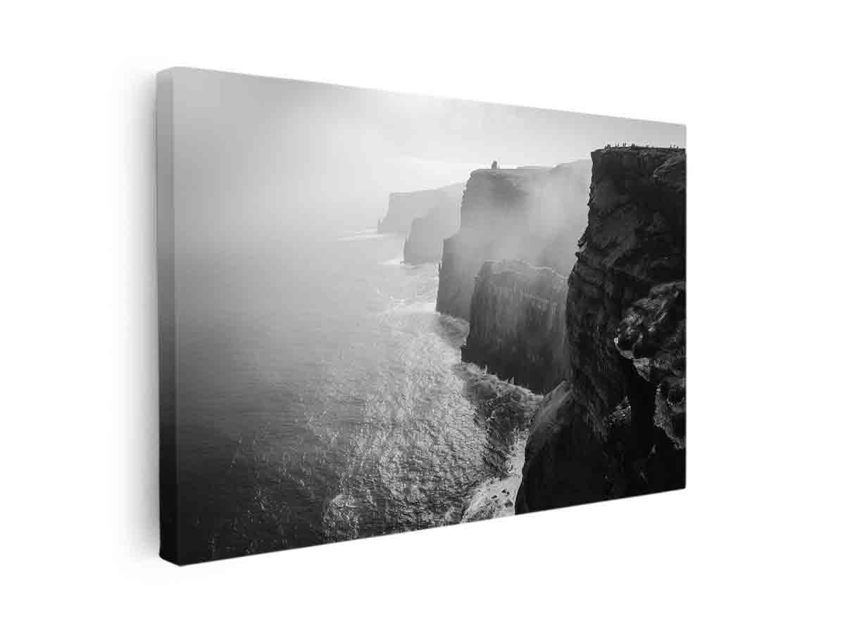 Black and white coastal cliff photography print with misty ocean for modern living room decor.