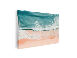 Aerial turquoise ocean waves over blush sand for calm coastal bedroom decor.