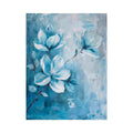 Soft blue magnolia floral canvas art for elegant bedroom or bathroom decor.