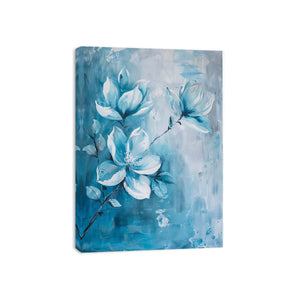 Soft blue magnolia floral canvas art for elegant bedroom or bathroom decor.