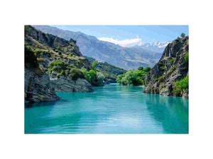 Turquoise mountain river canvas art for refreshing living room or office decor.
