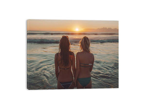 Coastal sunset beach canvas art with two women by the ocean for relaxed bedroom decor.