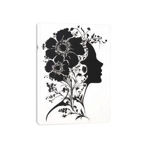 Black and white floral woman silhouette wall art for modern bedroom decor.