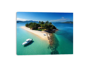 Tropical island aerial canvas art with turquoise ocean and sandy beach for coastal living room decor.