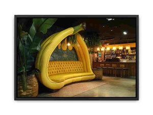 Oversized banana lounge artwork in tropical modern style for living room, home bar, and contemporary interior decor.