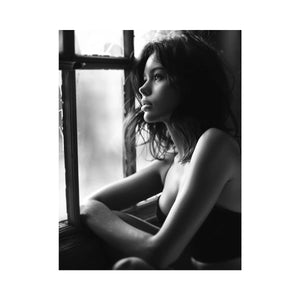 Black and white contemplative woman portrait canvas art with window light for modern bedroom and living room decor.