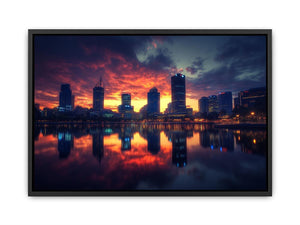 Dramatic city skyline photography with sunset reflections for modern office decor.