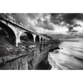 Black and white coastal bridge photography for moody modern office wall decor.