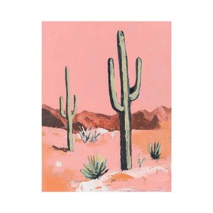Pink desert cactus canvas art with saguaro plants and mountains for warm southwestern decor.