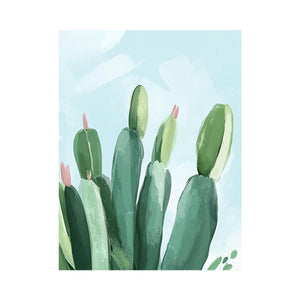Soft green cactus canvas art with pale blue sky for modern bedroom decor.