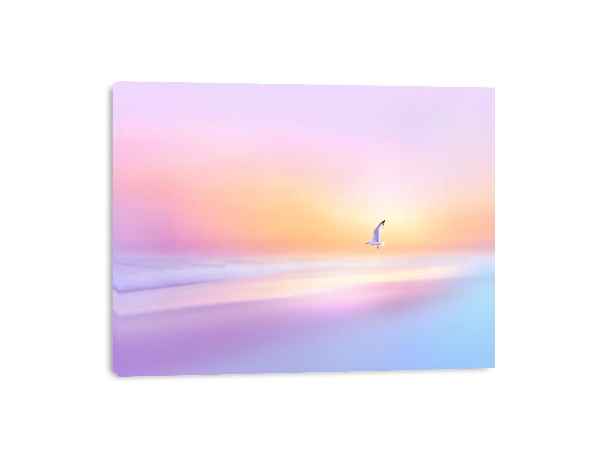 Pastel coastal beach scene with flying seabird for serene modern living room decor