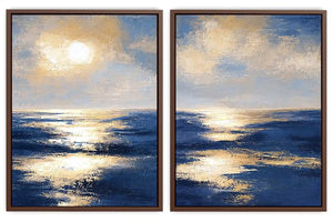 Blue and gold ocean canvas art with sunlit waves for luxury living room decor.