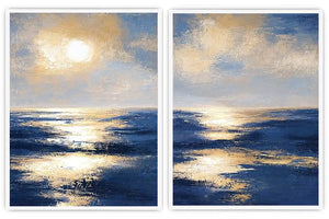 Blue and gold ocean canvas art with sunlit waves for luxury living room decor.