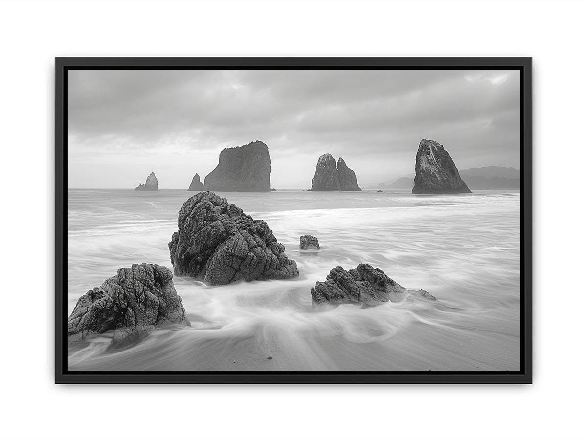 Black and white coastal landscape photography for serene living room decor