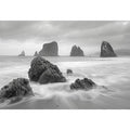 Black and white coastal landscape photography for serene living room decor