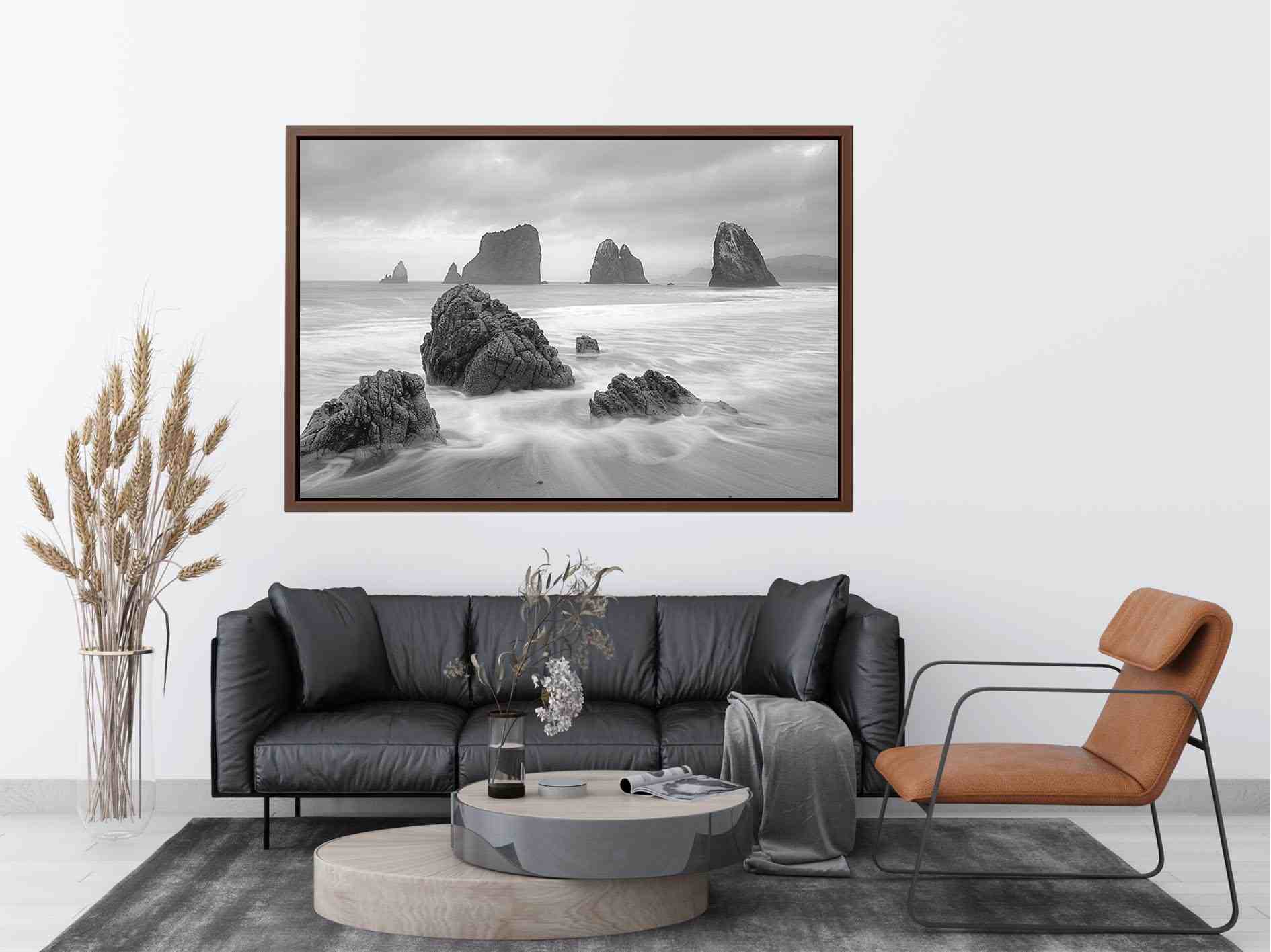 Black and white coastal landscape photography for serene living room decor