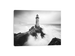 Black and white lighthouse photography wall art with storm waves for modern office decor.
