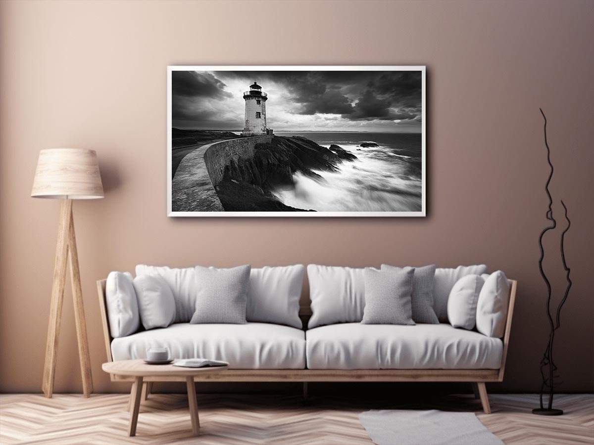 Moody black and white lighthouse wall art with storm clouds for modern living room decor.