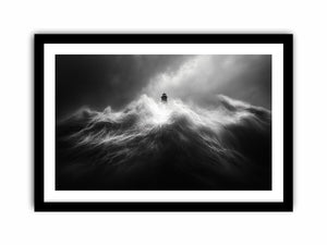 Black and white lighthouse wall art with storm waves for modern office decor.