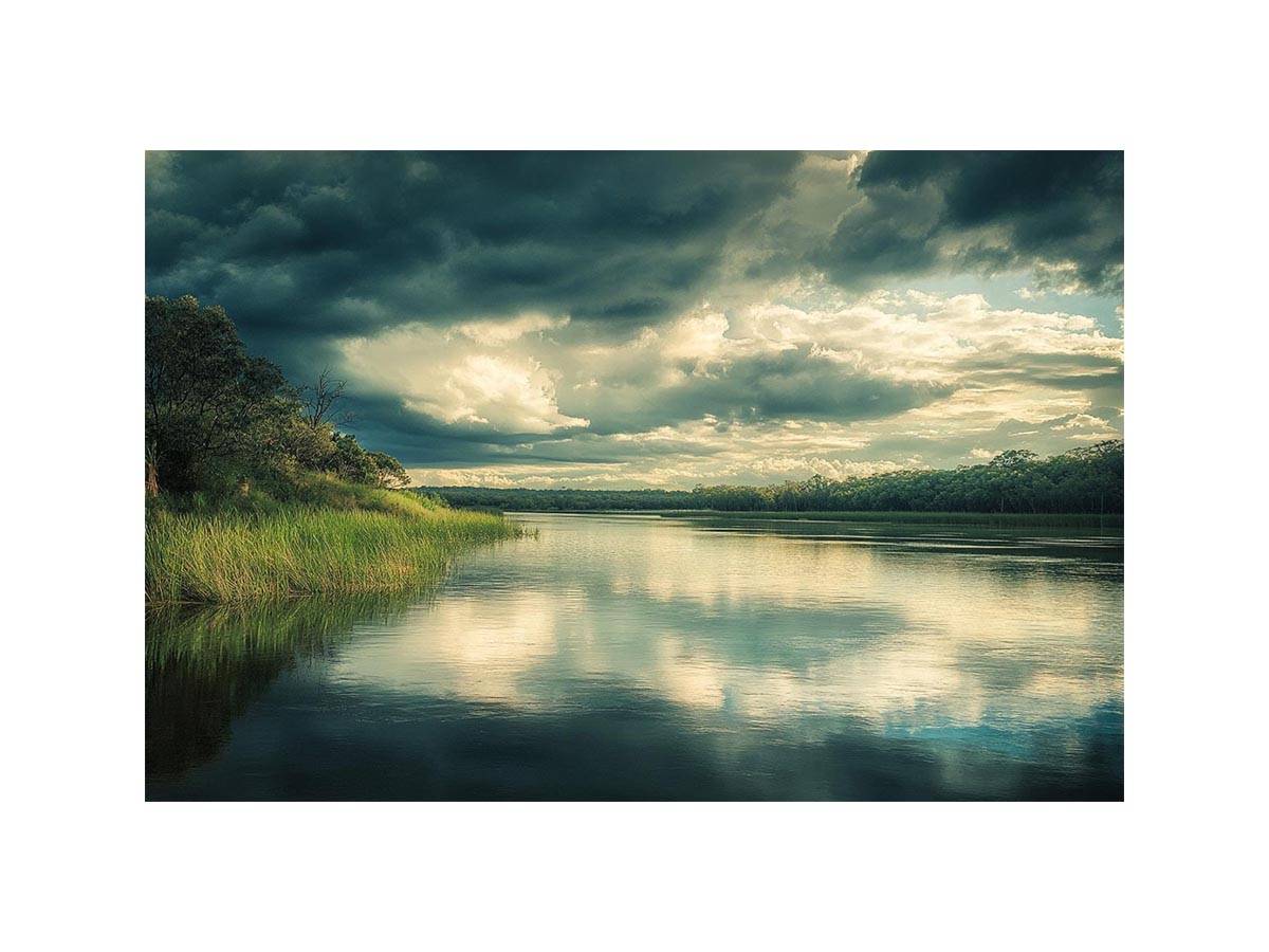 Moody lake canvas art with dramatic clouds and reflections for modern interior decor