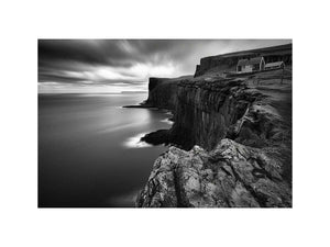 Black and white coastal cliff photography for modern living room decor.