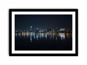 Night city skyline artwork with reflections for modern office decor.