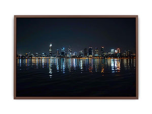 Night city skyline artwork with reflections for modern office decor.
